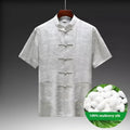 Mulberry silk Chinese style Tang suit for men in light green, showing traditional woven construction.