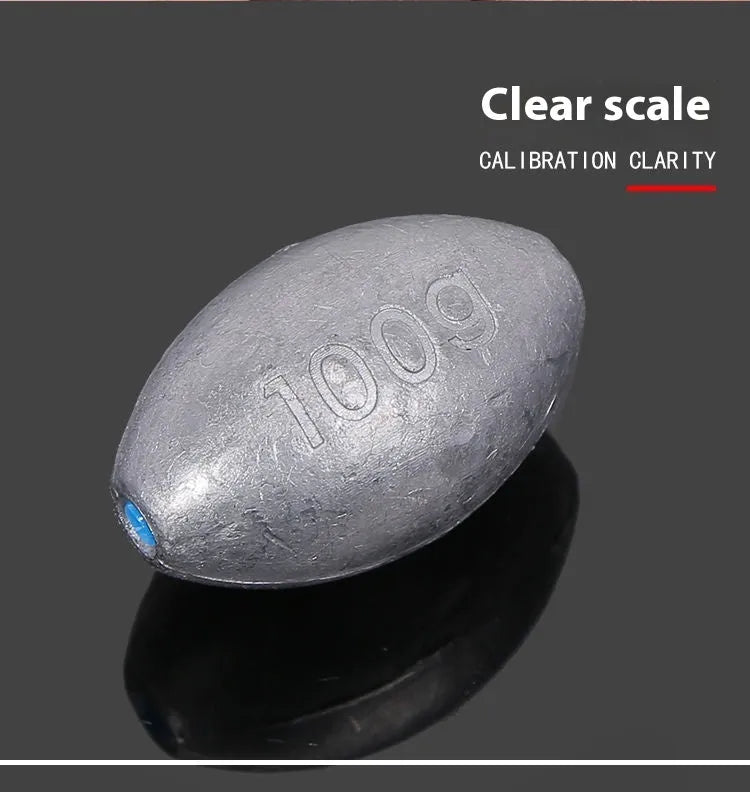 Tongxin olive-shaped lead fishing sinker with scale markings, showing rugby shape and plastic core construction.