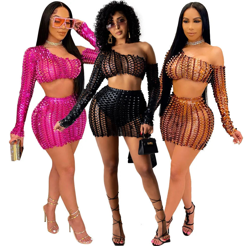 Women's black hollow-out net two-piece dress set with sleeveless top and short skirt.