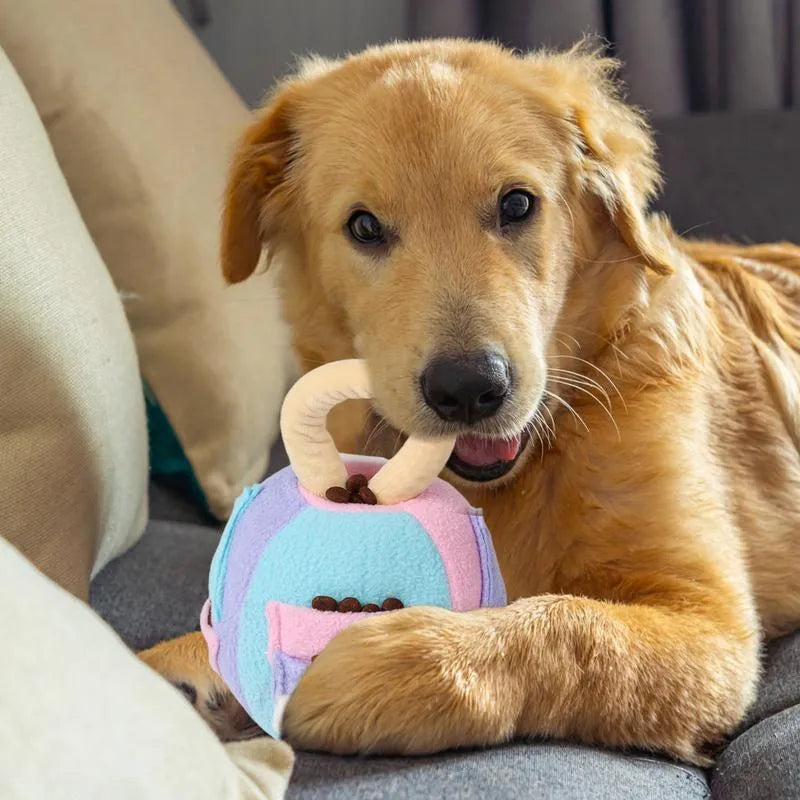 Pink and green squeaky plush ball dog toy with treat pockets for small to medium breed dogs