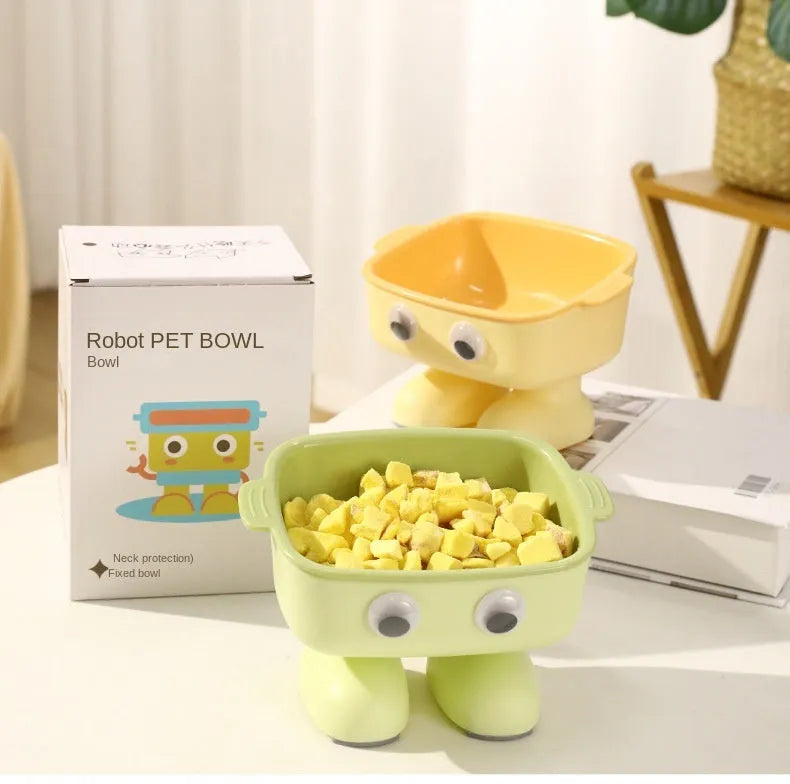 Green robot-shaped elevated cat bowl with tilted design and anti-slip base