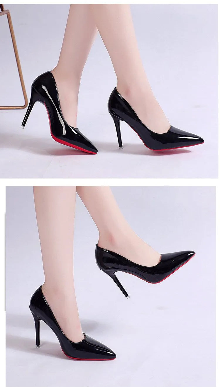 Women's black pointed toe stiletto heel pump with a low top and rubber sole.