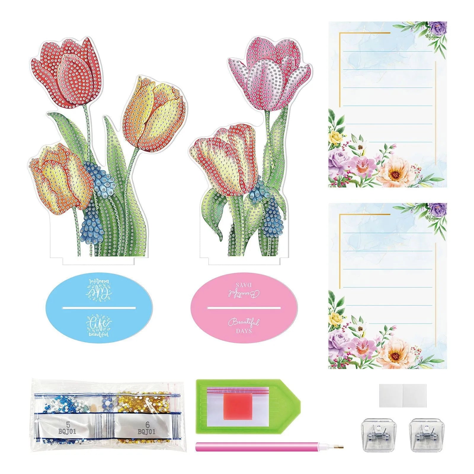 Diamond painting decorative note clip with frameless handmade American craft design on a desktop.