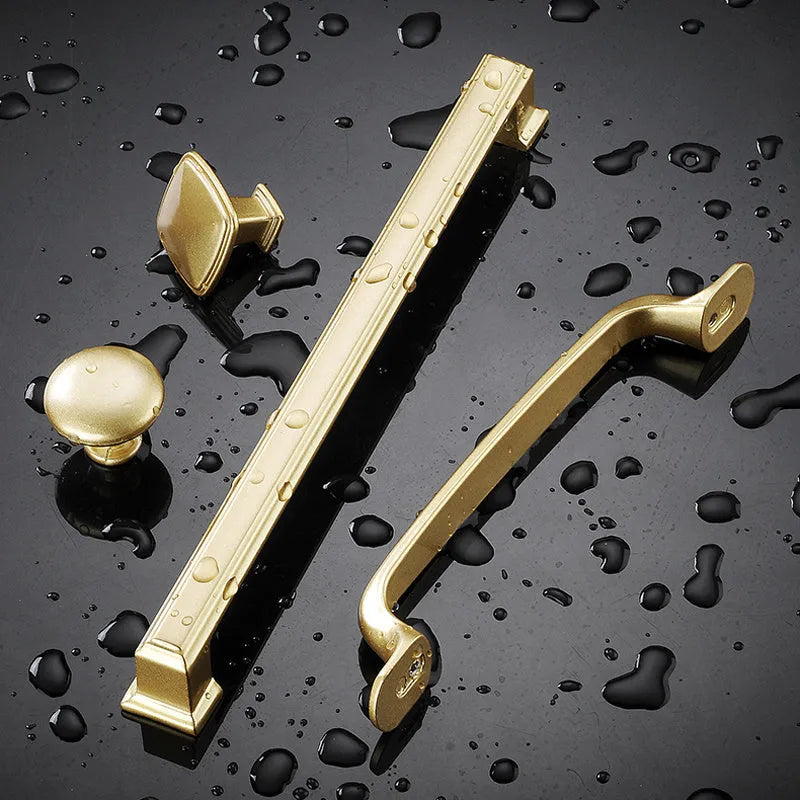 Gold T-shape single hole cabinet handle with measurement options for wardrobe and drawer installation