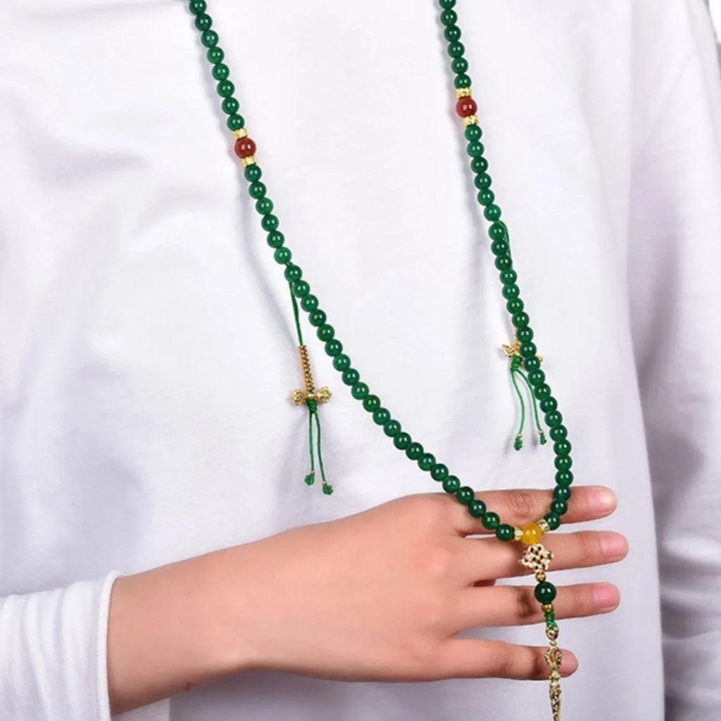 Natural green agate multi-circle bracelet for men and women on a wrist, showing bead detail.