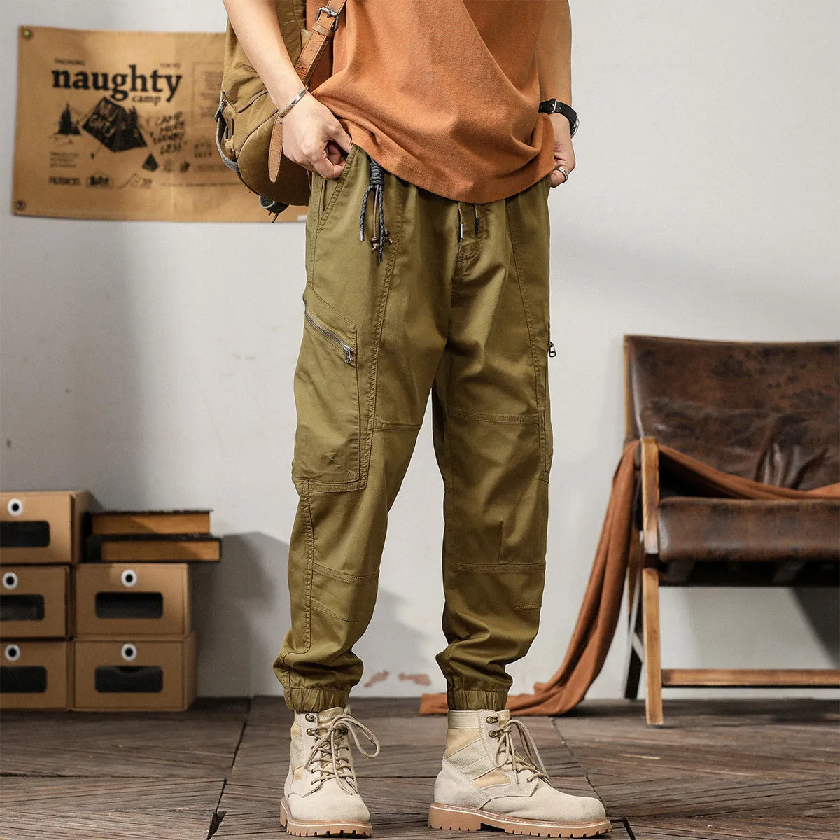 Men's loose fit khaki harem pants with ankle band and zip fly, made from non-ironing cotton fabric.