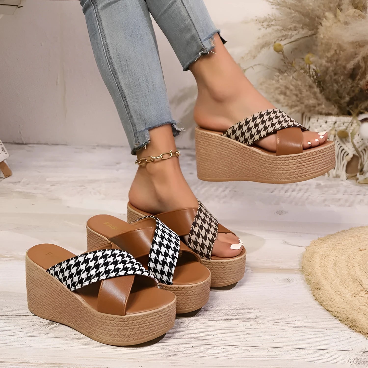 Brown and black cross leopard plaid pattern on casual wedge sandals with a rubber sole.