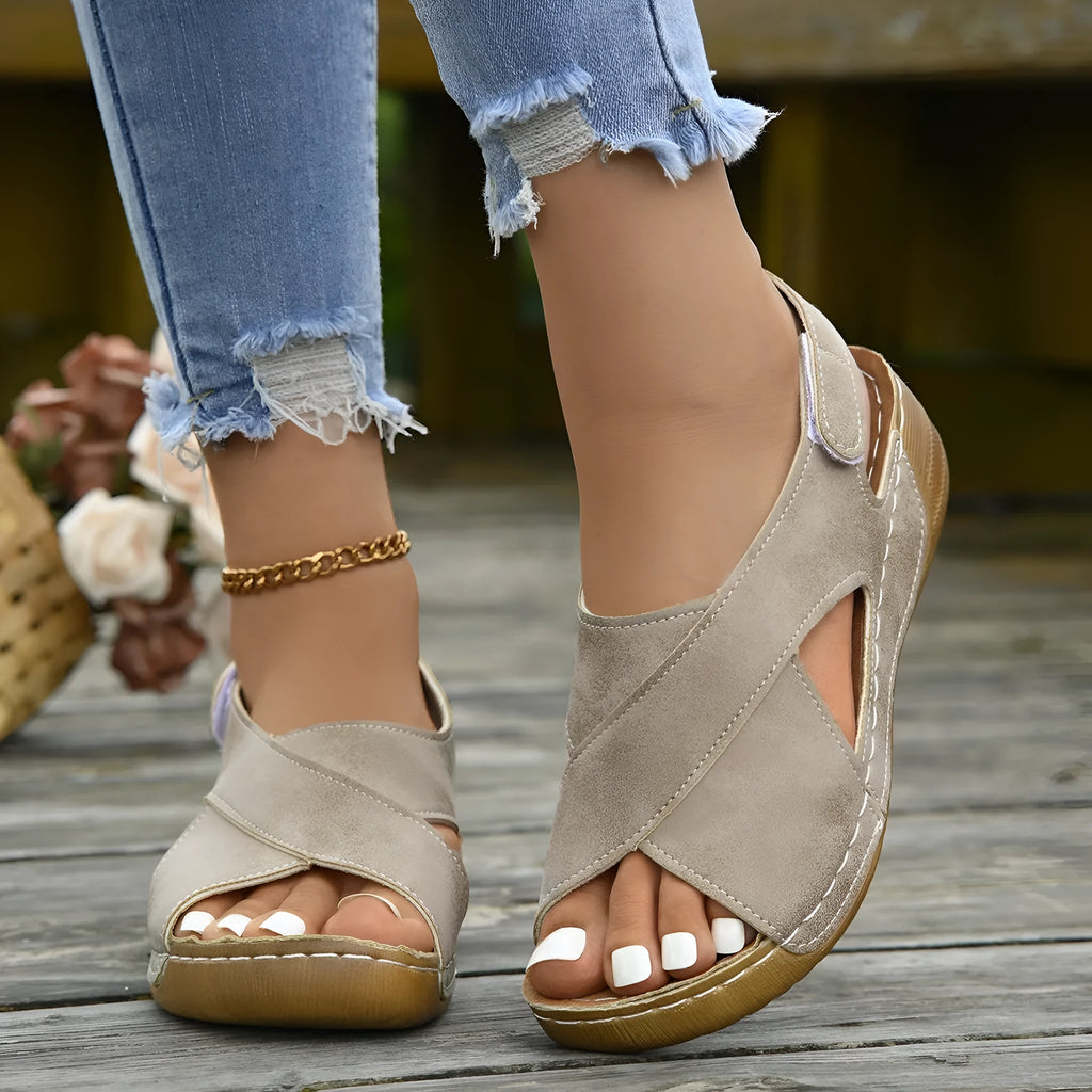 Roman platform sandals with a removable skirt and Velcro strap in a khaki colour.