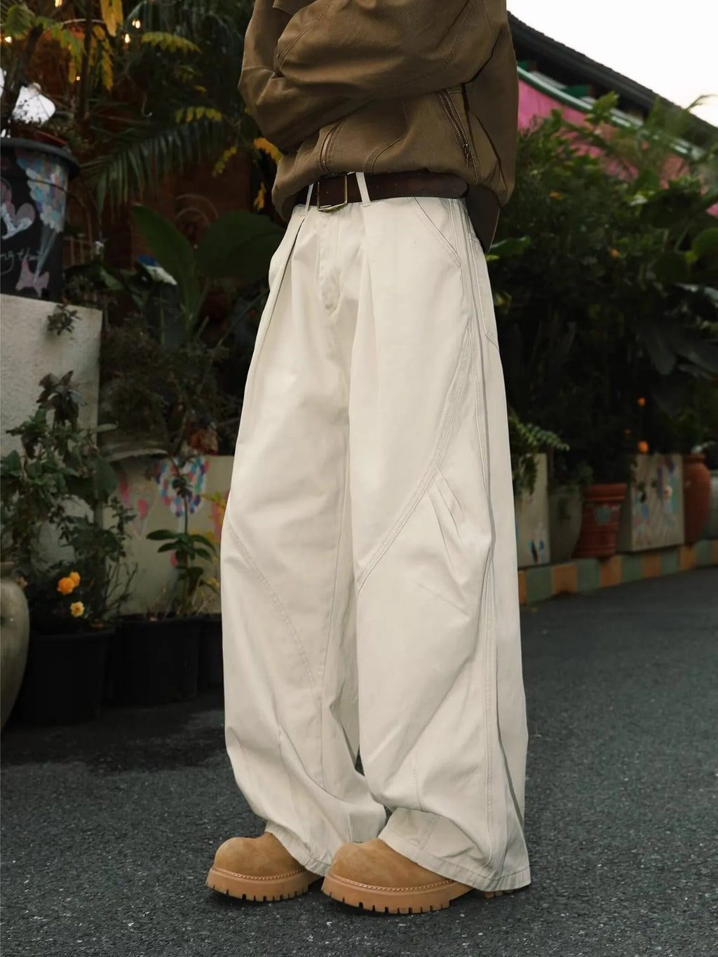 Men's straight leg trousers in striped black, brown and apricot colours with elasticated fabric