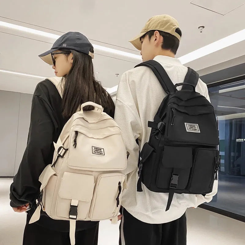 Nylon student backpack with computer compartment in black and white colour options