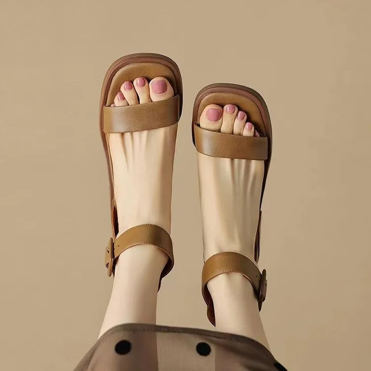 Women's white ankle-strap platform heels with round toe design