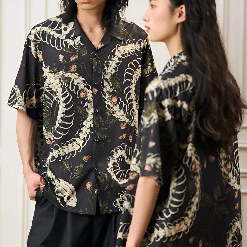 Short sleeve Cuban collar shirt with printed snake bone floral pattern in loose fit.
