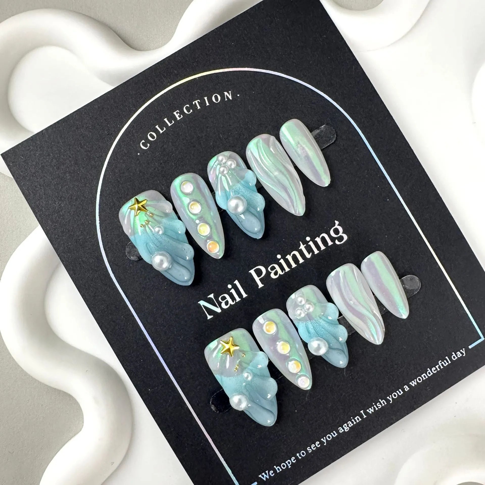 Blue plastic wearable nail armour set in sizes XS, S, M, L for ladies' nail decoration