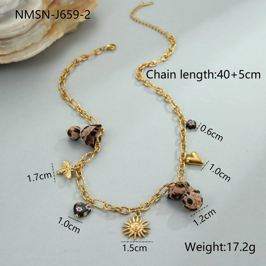 Geometric pendant stainless steel necklace with leopard, love heart and flower designs on adjustable chain