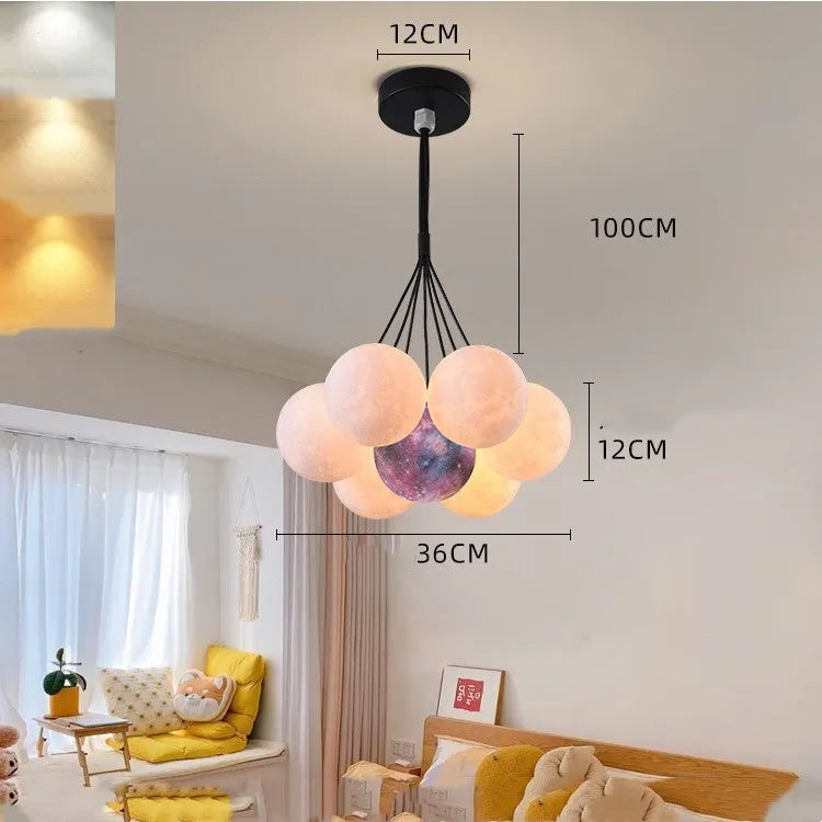 Nordic style gold and black iron LED chandelier with bubble-shaped lights for bedroom or study ceiling.