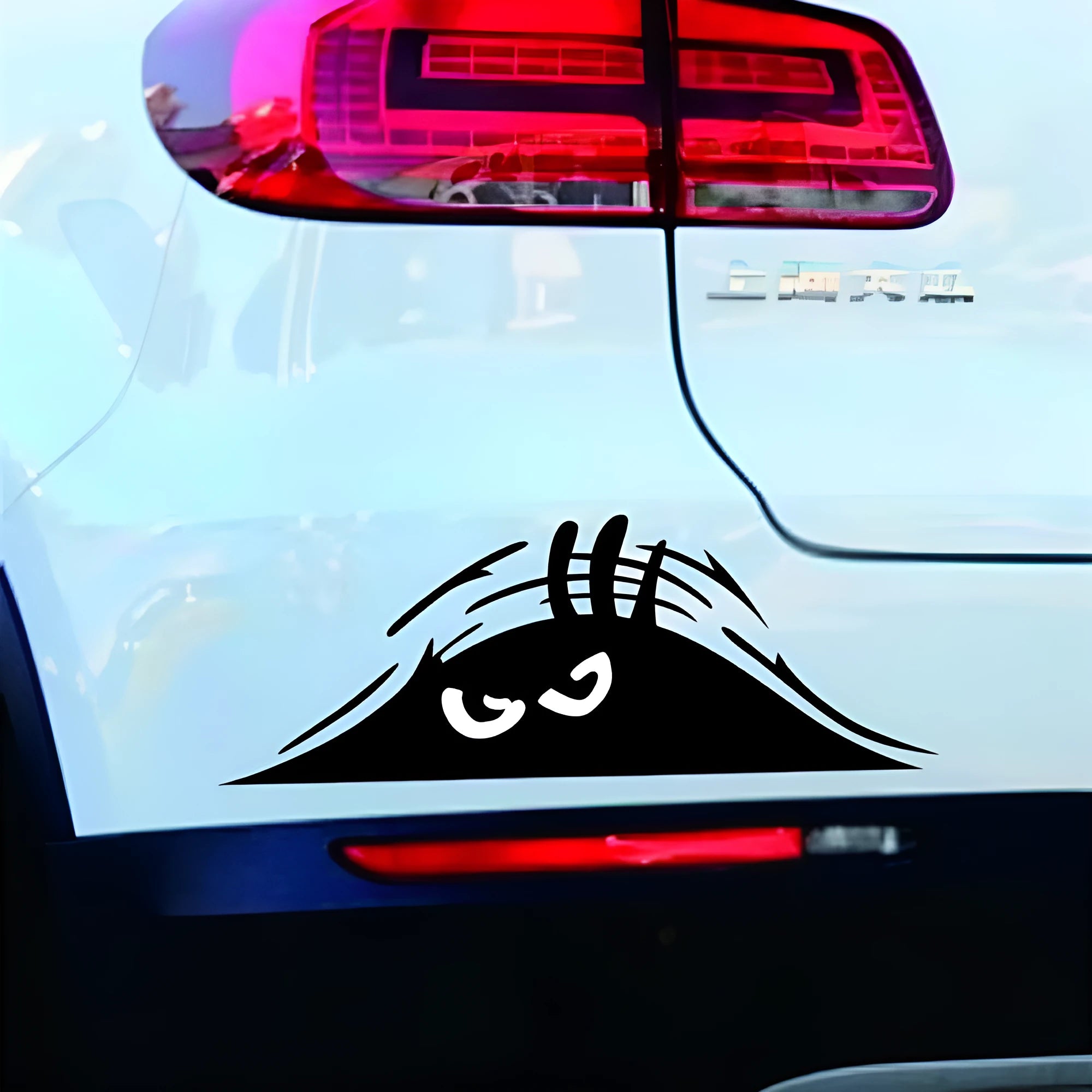 Four self-adhesive body stickers showing smiley and angry face designs measuring 19cm by 7cm