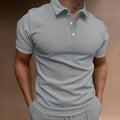 Men's loose fit short sleeve t-shirt in a cotton blend fabric, shown in multiple colour options.