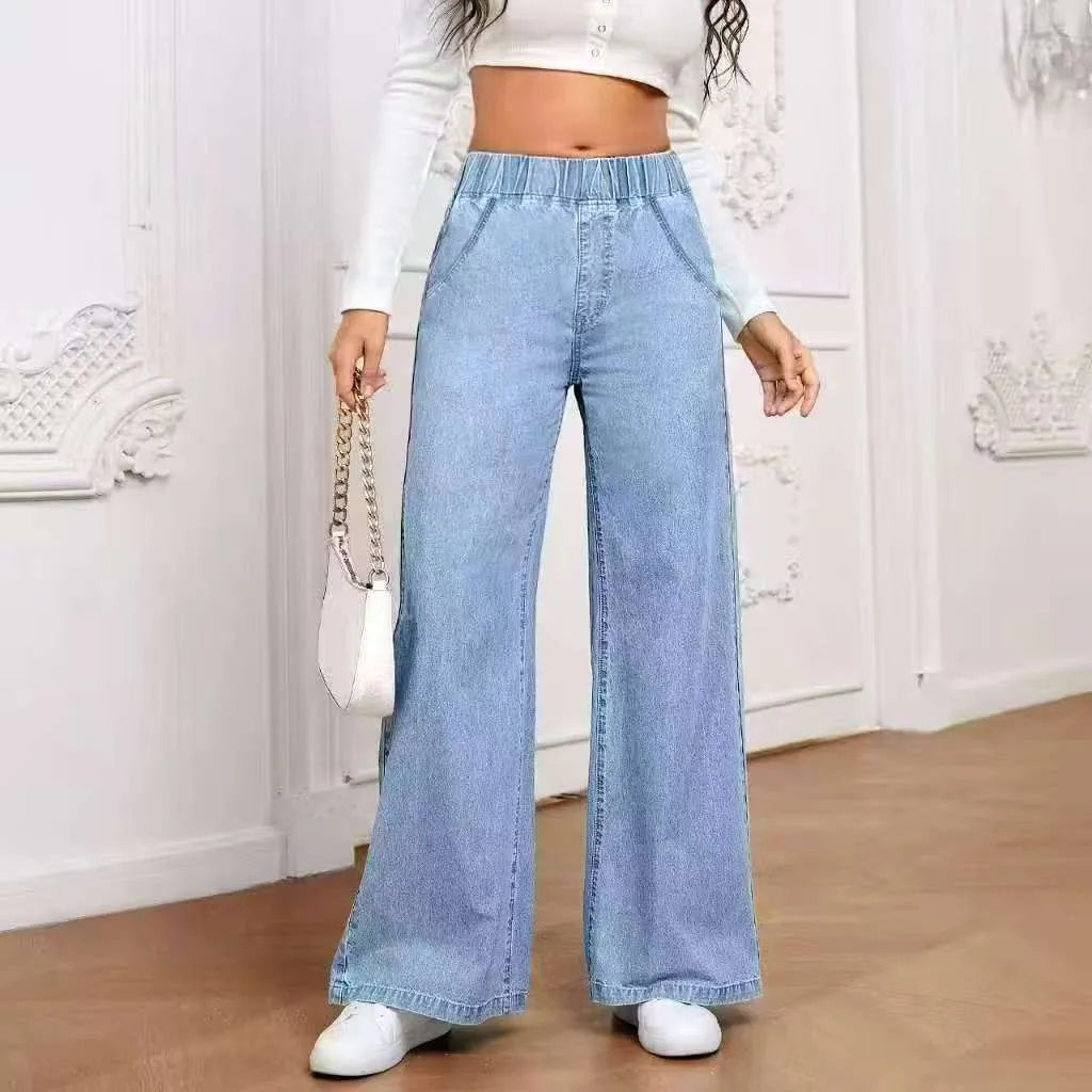 Light blue washed wide-leg denim trousers on a hanger, showing mid-rise waist and straight leg cut.