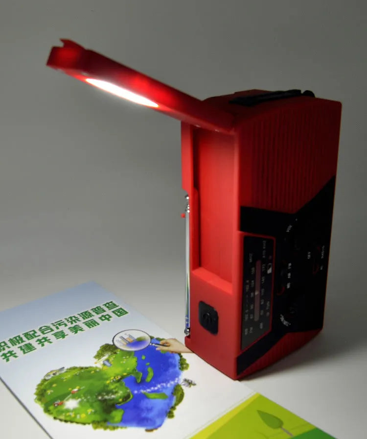 5 in 1 outdoor portable solar crank AM FM NOAA radio with LED flashlight, reading lamp, and power bank, available in green, orange, or red