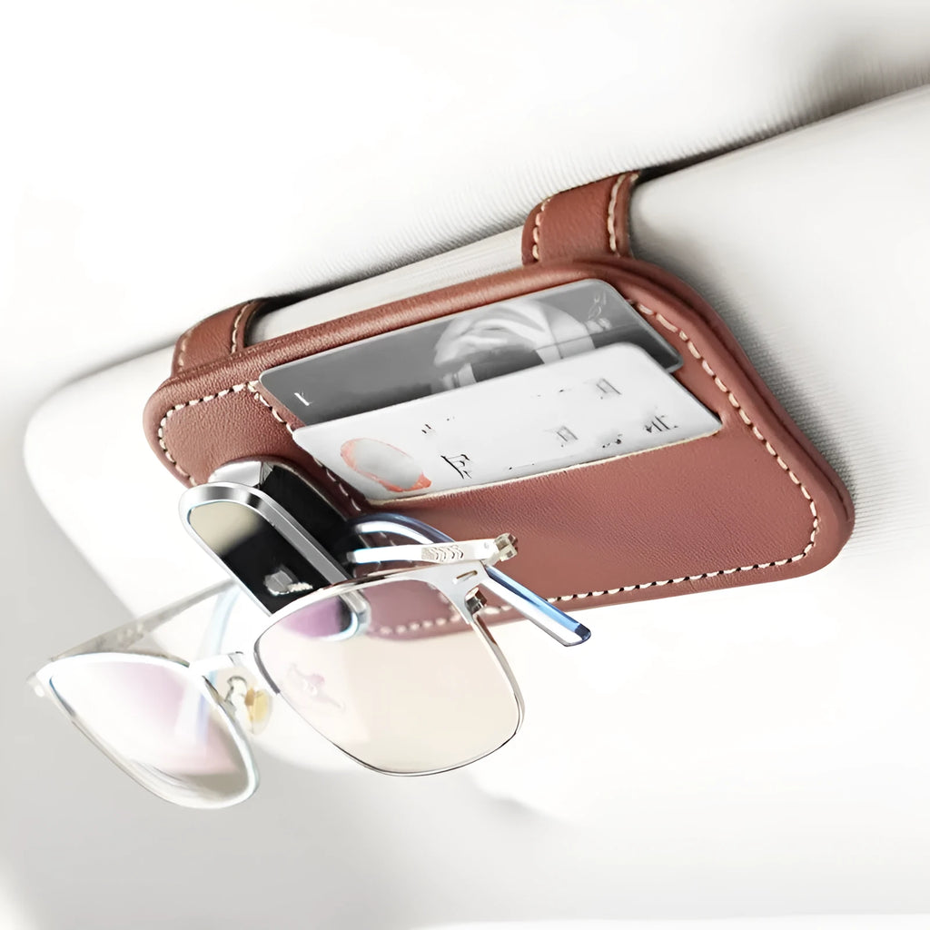 Genuine cowhide leather car sun visor holder with clip for sunglasses, shown in a selection of colours.