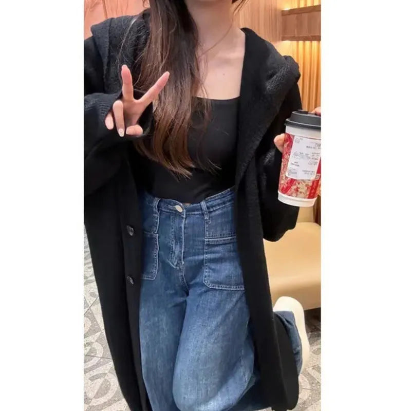 Korean style long hooded cardigan for women in oatmeal colour, showing below-the-knee length and loose fit.