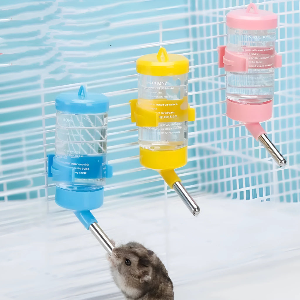 Green ball kettle pet water bottle with drinking tube attached to a small animal cage.