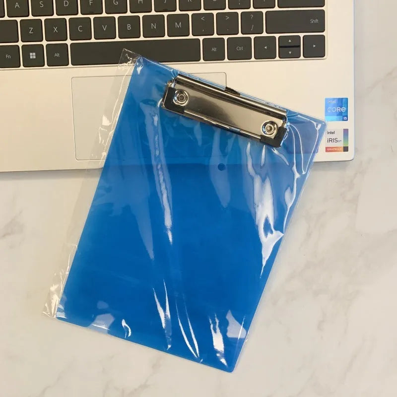 Transparent A4 plate holder with metal clip, shown in blue, acting as a writing board and document folder.