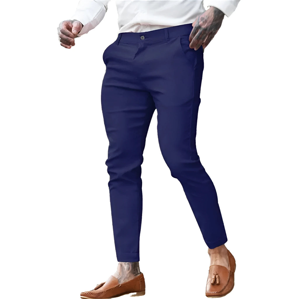 Men's slim-fit pencil trousers in stretch cotton twill fabric, shown in a dark blue colour.