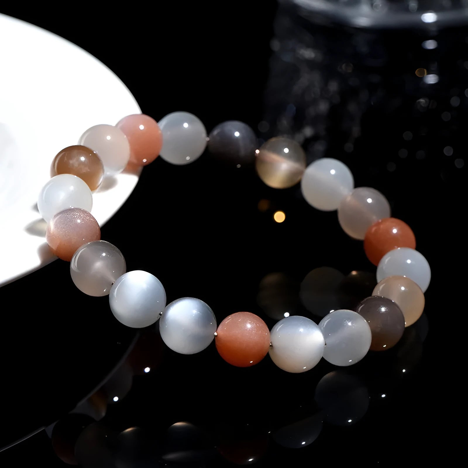 Natural colourful moonlight moonstone bracelet with 8mm beads on wrist.