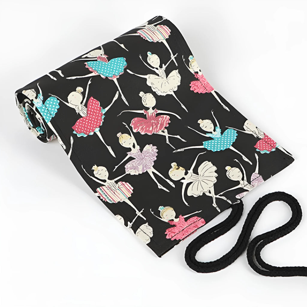 Canvas roll-up pencil case with ballet girl print, shown unrolled to display multiple pencil loops.