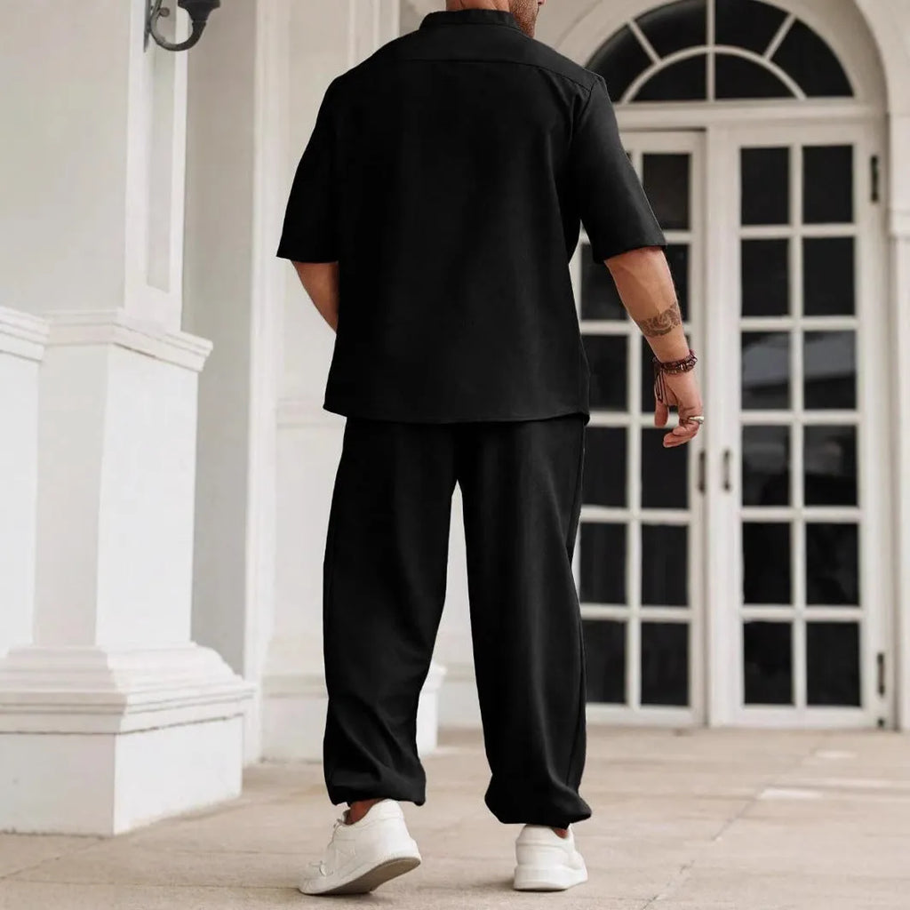 Men's apricot cotton linen casual short-sleeved shirt and trousers set laid flat.
