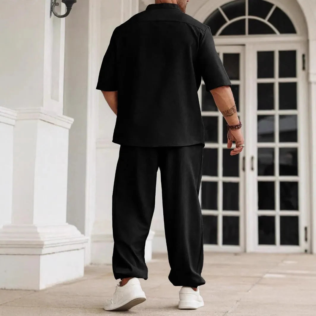 Men's apricot cotton linen casual short-sleeved shirt and trousers set laid flat.