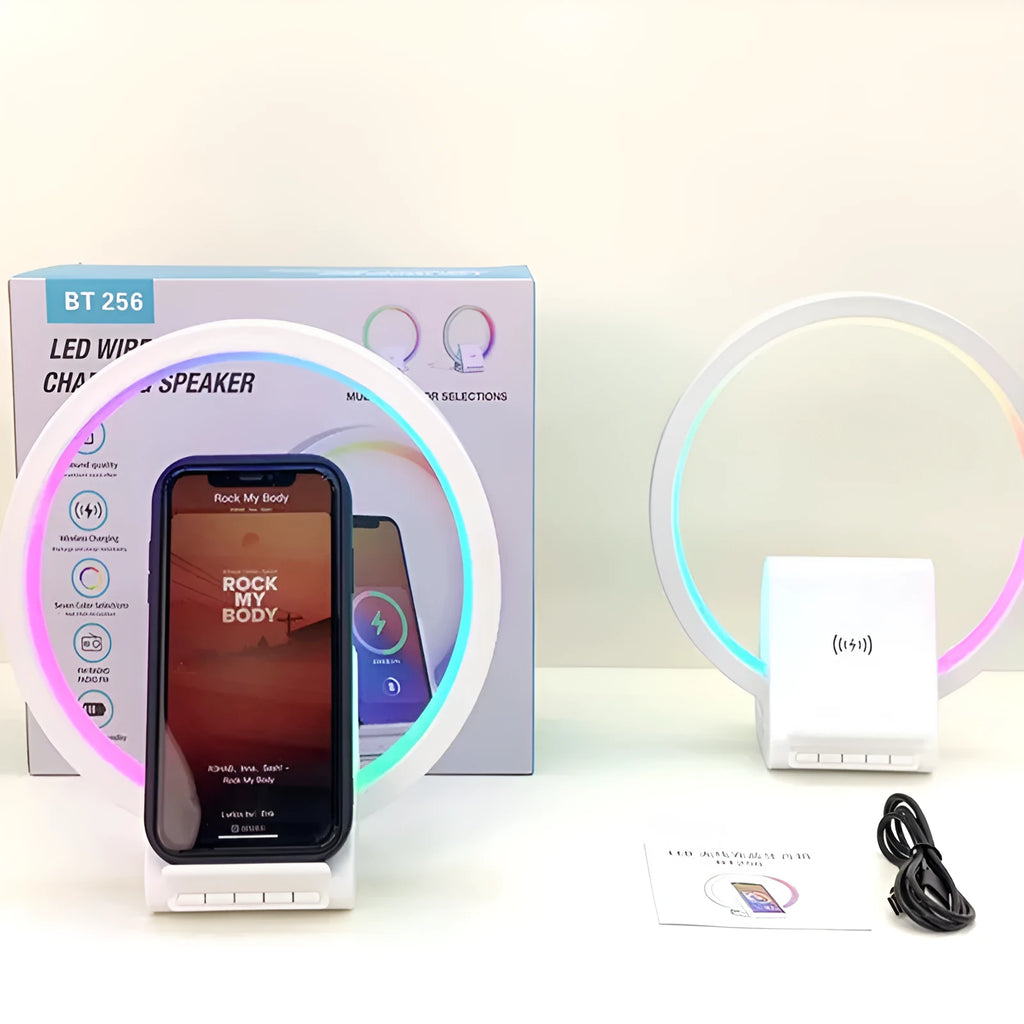 White rectangular smart Bluetooth speaker with wireless charging pad and ambient lighting
