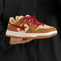 Brown women's low-top platform sneakers with sequin accents and front lace-up closure