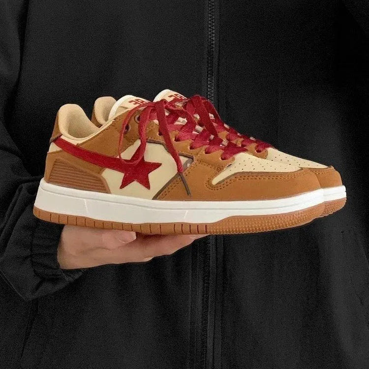 Brown women's low-top platform sneakers with sequin accents and front lace-up closure