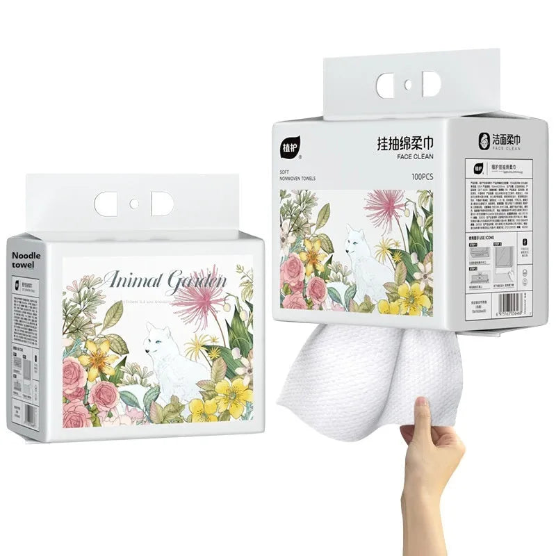Disposable hanging roll of soft white face cloths with 100 sheets