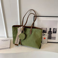Green casual large capacity polyester tote bag with shoulder strap and external pocket.