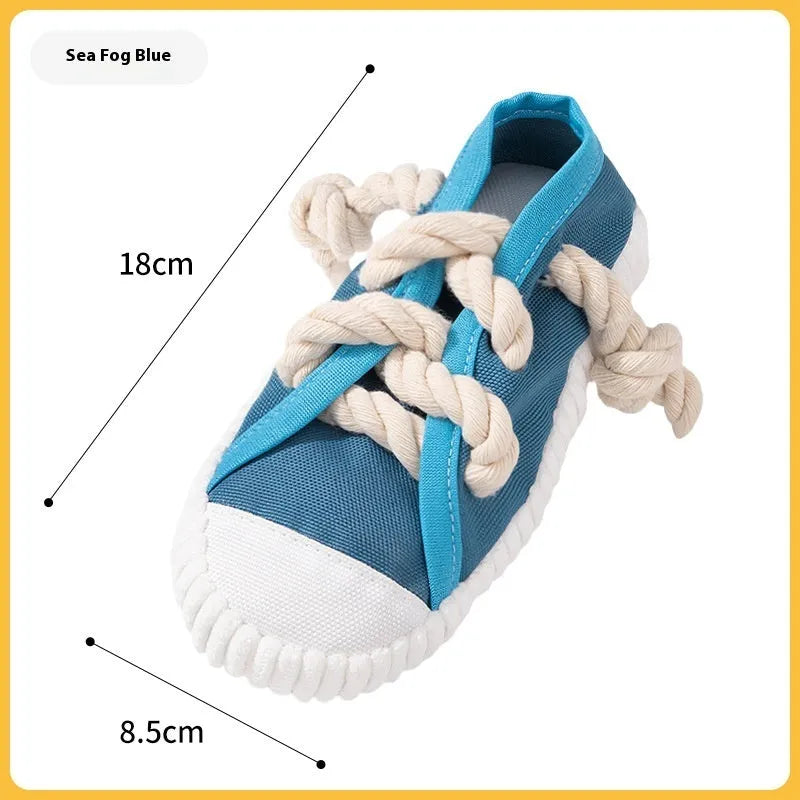 Dog squeaker toy shaped like slippers in yellow, black, or blue for chewing and stress relief