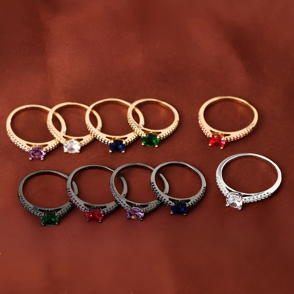 Copper hexagon geometric ring in electroplated gold rose red colour on a size 8 finger.