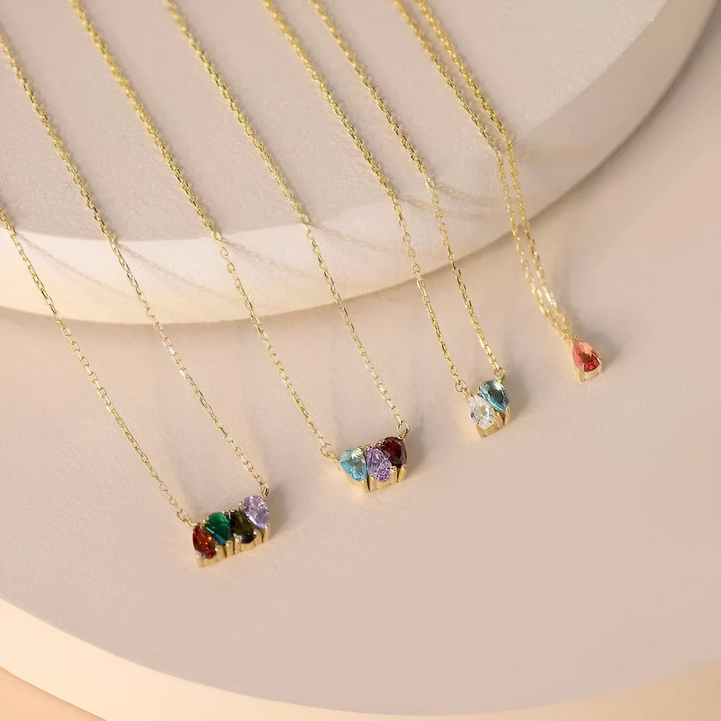 Zircon birthstone pendant on a titanium steel clavicle chain in silver, gold, or rose gold.