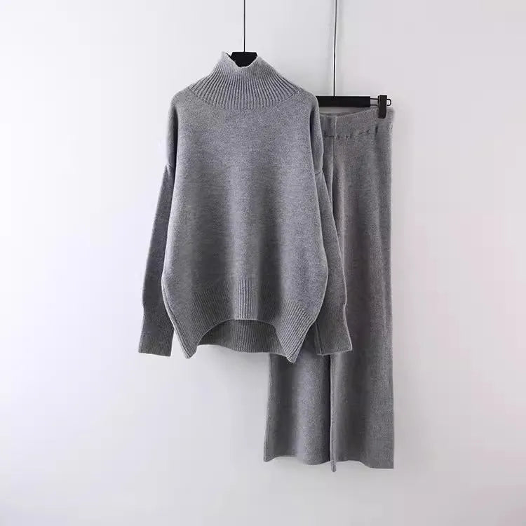 Women's casual acrylic fibre sweater and wide leg pants two-piece set in a solid colour.