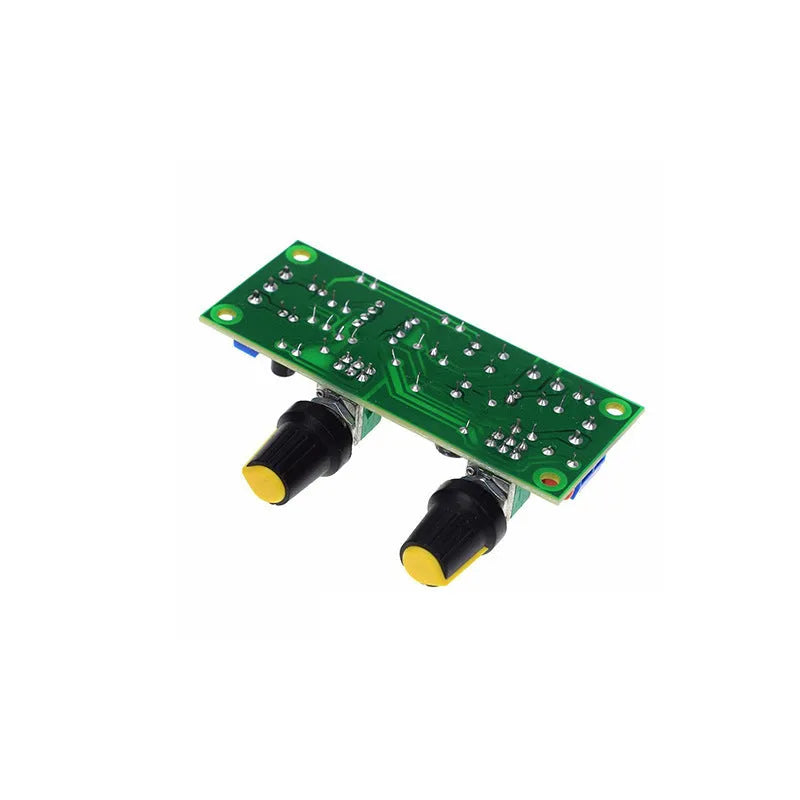 Front stage amplifier circuit board with bass boost components on green FR-4 fibreglass