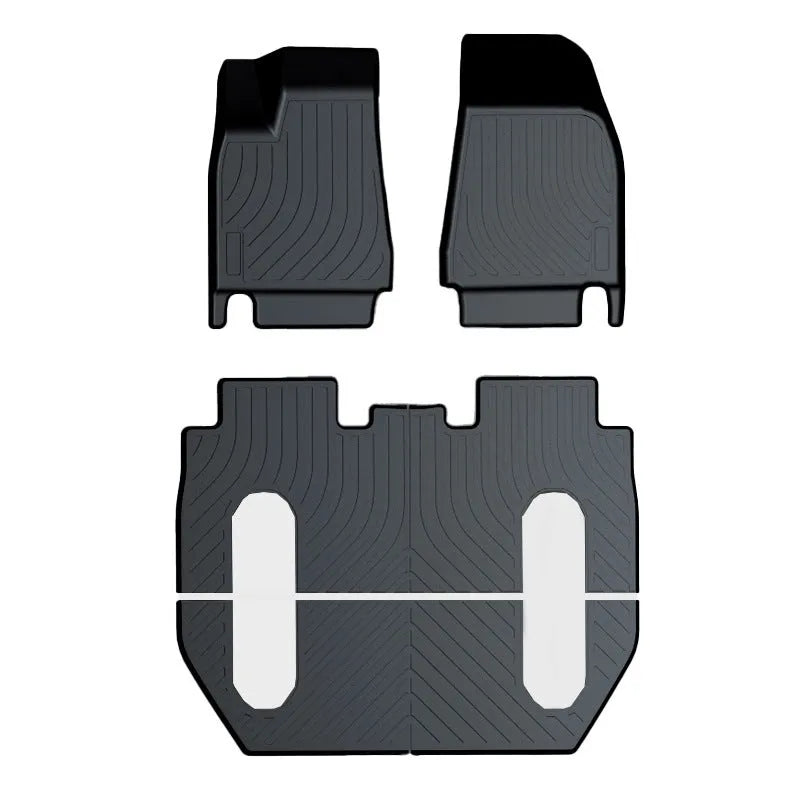 Tesla floor mats made from black rubber with textured TPE footrest section for Model 3, Y, S, and X vehicles