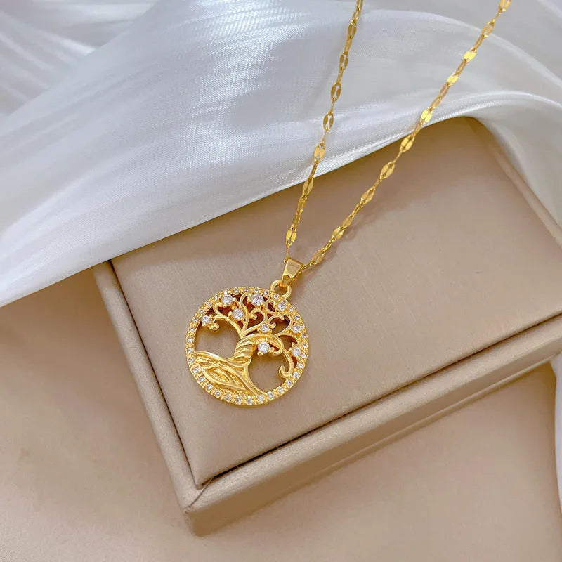 Gold-plated cross necklace with mother pearl pendant and full rhinestone detailing on adjustable stainless steel chain