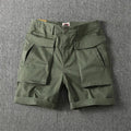 Men's straight cut cotton stretch cargo shorts in khaki with multiple pockets.