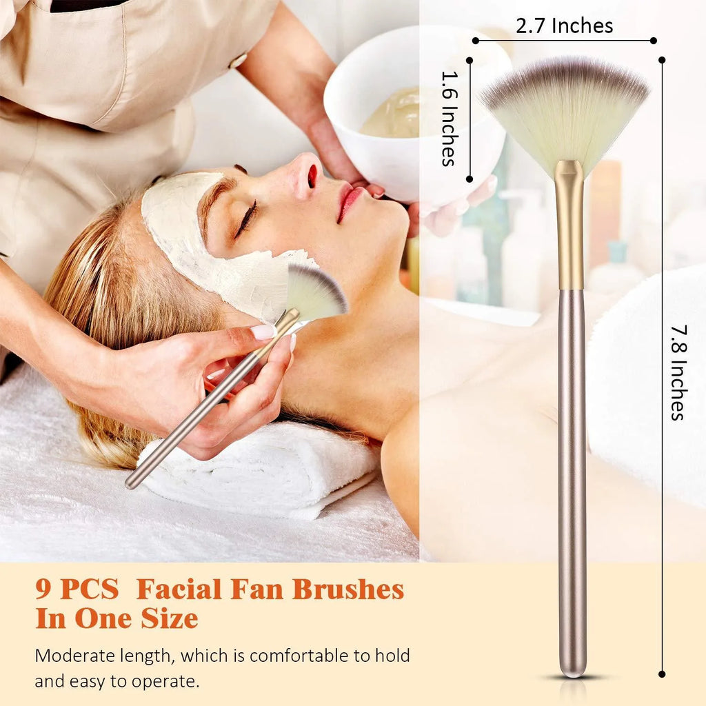 Set of 10 white-handled facial fan brushes with soft bristles and individual plastic brush covers.