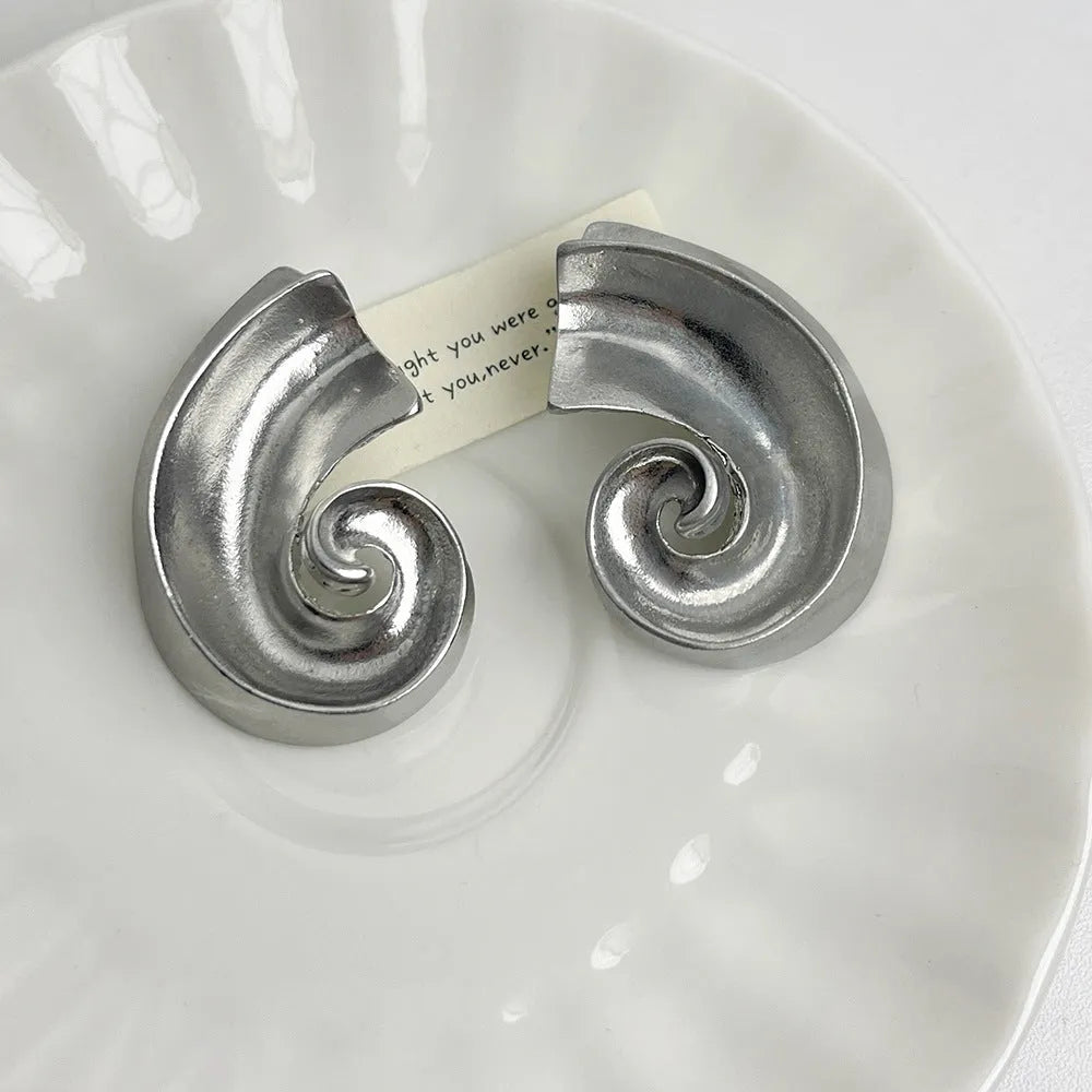 Retro geometric alloy ear studs measuring 5cm in gold and silver electroplated finishes.