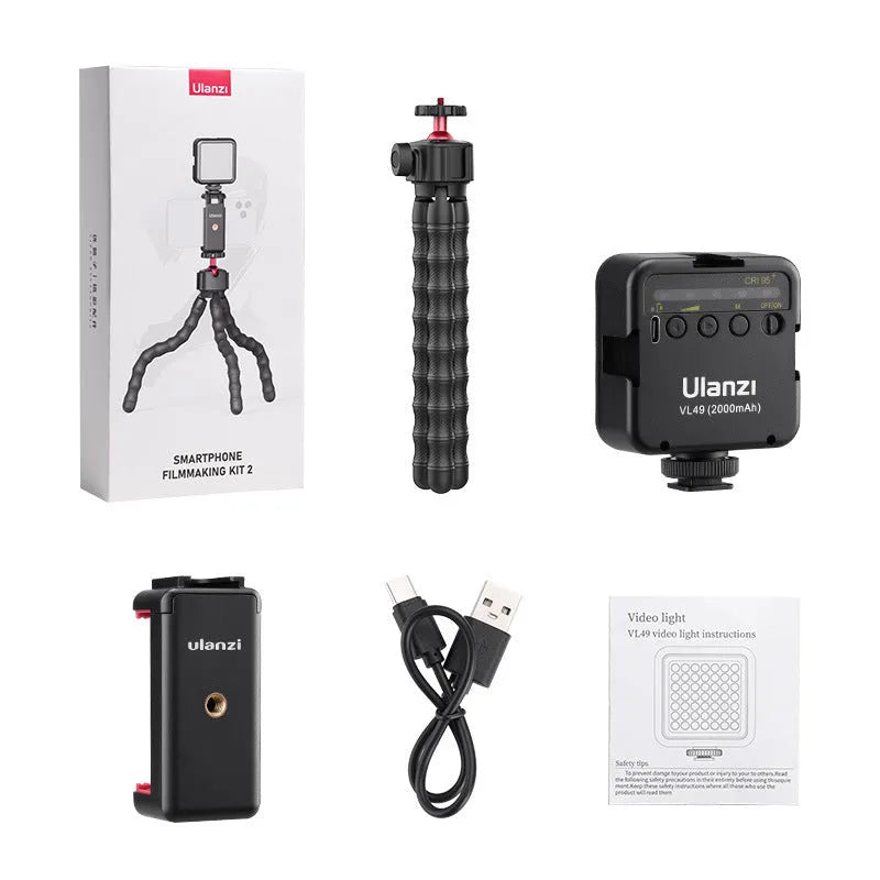 2985 piece vlogging studio kit with tripod, light stands, and camera mounting hardware