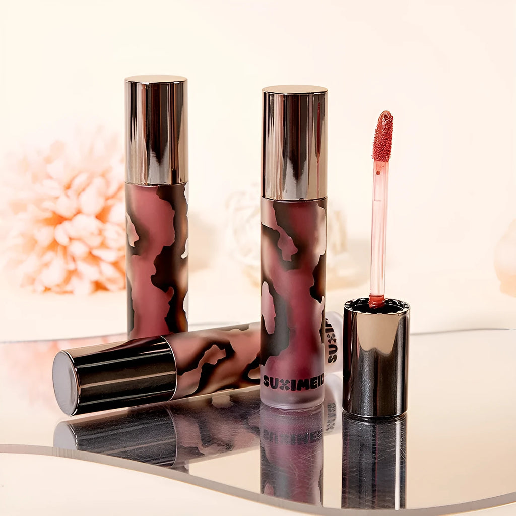 Lava Secret Matte Lip Mud Lipstick in 5 shades showing orange brown coffee, cool grey, cinnamon coffee, jujube red and smoked purple colours