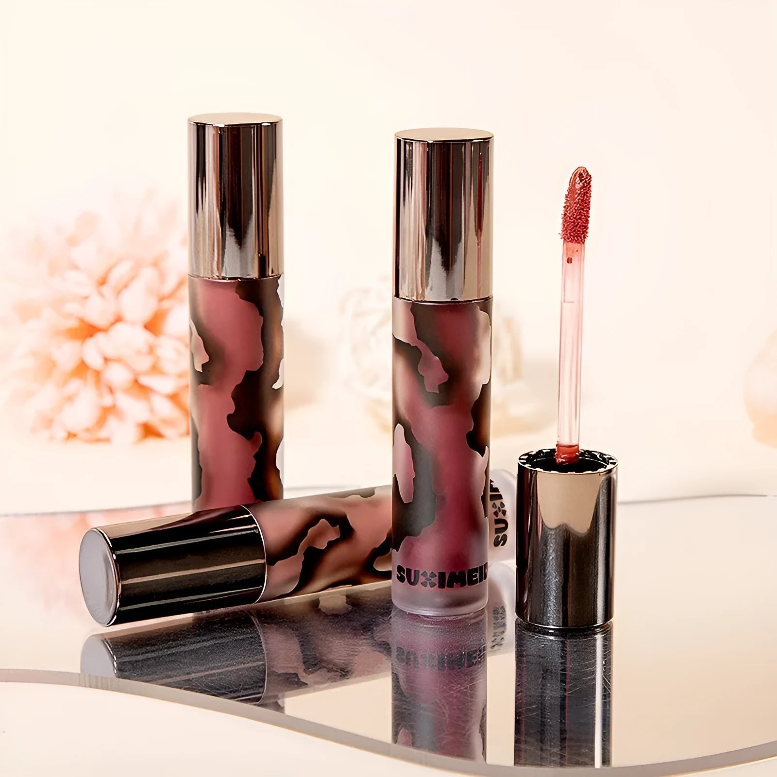 Lava Secret Matte Lip Mud Lipstick in 5 shades showing orange brown coffee, cool grey, cinnamon coffee, jujube red and smoked purple colours
